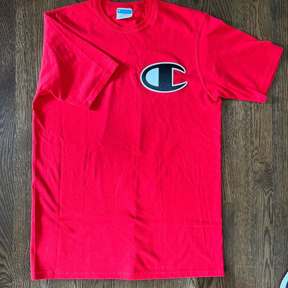 Mens Champion tee Brand new… never worn.